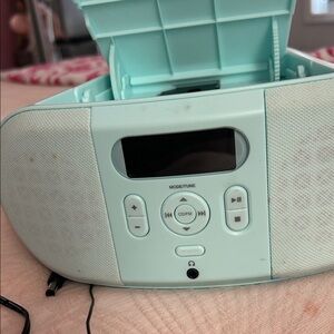 On Running Aqua Portable CD Player and radio station